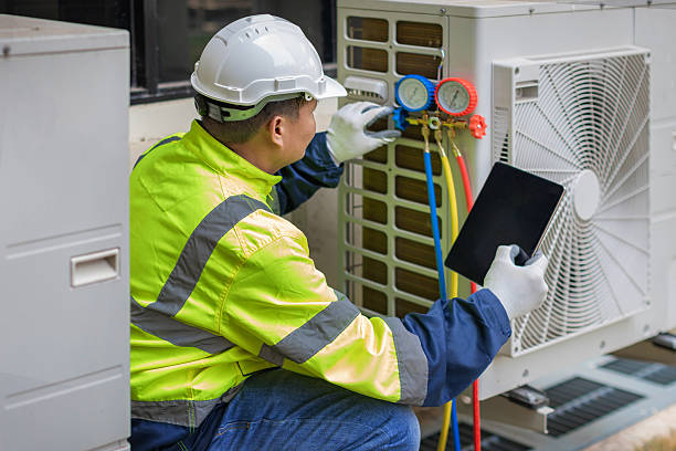 Professional Hvac technician working in Owens Cross Roads, AL